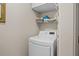 Efficient laundry area equipped with a modern dryer and organized shelving for convenient storage and functionality at 1617 Southwick Dr, Johns Island, SC 29455