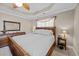 Bedroom features a tray ceiling, ceiling fan, and decorative furniture at 1617 Southwick Dr, Johns Island, SC 29455
