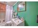 Simple bathroom with white vanity, toilet, and shower with curtain at 1644 Cooper Store Rd, Moncks Corner, SC 29461