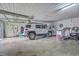 Spacious garage with an SUV inside, featuring ample storage space and an open layout for easy vehicle maneuvering at 1644 Cooper Store Rd, Moncks Corner, SC 29461