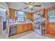 Functional kitchen equipped with stainless steel appliances, a sink, and ample storage space at 1644 Cooper Store Rd, Moncks Corner, SC 29461