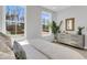 Bedroom showcasing large windows for natural light, along with elegant decor at 165 Cantona Dr, Summerville, SC 29483