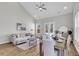 Inviting open-concept living space with vaulted ceilings and a dining area, filled with natural light at 165 Cantona Dr, Summerville, SC 29483