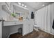 Bathroom featuring a modern vanity, stylish decor, and a shower with white tile at 166 Pavilion St, Summerville, SC 29483