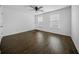 Spacious bedroom with sleek hard floors and abundant natural light from two large windows at 166 Pavilion St, Summerville, SC 29483