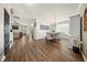 Open-concept dining area features a modern chandelier, neutral walls, and a seamless flow to living spaces at 166 Pavilion St, Summerville, SC 29483