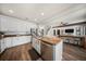 Kitchen and living room features granite countertops, stainless appliances and barstool seating at 166 Pavilion St, Summerville, SC 29483