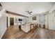Spacious living room with exposed beam, ceiling fan and built in table with bar stools at 166 Pavilion St, Summerville, SC 29483