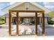 Pool house with picnic tables and lounge chairs for community residents at 166 Pavilion St, Summerville, SC 29483