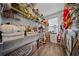 Neatly organized storage room with shelves and plenty of decor and holiday items at 166 Pavilion St, Summerville, SC 29483