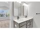 Modern bathroom with double vanity, sleek mirrors, and contemporary fixtures at 169 Cantona Dr, Summerville, SC 29483