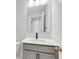 A modern bathroom featuring a sleek vanity and a well-lit mirror at 169 Cantona Dr, Summerville, SC 29483