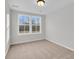 A well lit bedroom with natural light and carpet at 169 Cantona Dr, Summerville, SC 29483
