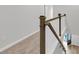 Carpeted hallway featuring a wood and white baluster staircase at 169 Cantona Dr, Summerville, SC 29483