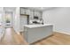 Modern kitchen with stainless steel appliances and kitchen island with quartz countertops at 169 Cantona Dr, Summerville, SC 29483