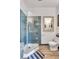 Stylish bathroom showcasing a glass-enclosed shower, wood-look flooring, and a modern vanity at 1808 Ion Ave, Sullivans Island, SC 29482