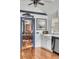 Quaint kitchen featuring a farmhouse sink, stainless steel appliances, and charming nautical decor at 1808 Ion Ave, Sullivans Island, SC 29482