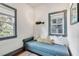Charming reading nook with daybed, accent pillows and natural light, perfect for relaxing at 1808 Ion Ave, Sullivans Island, SC 29482