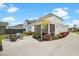 Landscaped backyard showcasing a patio with seating, lush garden beds, and a serene outdoor setting at 182 Callibluff Dr, Summerville, SC 29486