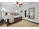 Bedroom with en-suite bathroom, hardwood floors, ample light and warm decor at 182 Callibluff Dr, Summerville, SC 29486