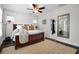Bedroom with en-suite bathroom, hardwood floors, ample light and warm decor at 182 Callibluff Dr, Summerville, SC 29486