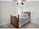 Cozy bedroom with soft carpet, a wood-framed bed, and neutral walls for a calming atmosphere at 182 Callibluff Dr, Summerville, SC 29486