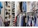 Organized walk-in closet with ample shelving, hanging space for clothes, and separate area for shoes and accessories at 182 Callibluff Dr, Summerville, SC 29486