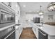 Spacious kitchen featuring stainless appliances, white cabinetry, and island at 182 Callibluff Dr, Summerville, SC 29486
