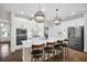 Bright kitchen with large island, modern appliances, pendant lighting, and breakfast bar at 182 Callibluff Dr, Summerville, SC 29486
