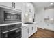 Well-equipped kitchen with stainless steel appliances and white cabinetry at 182 Callibluff Dr, Summerville, SC 29486
