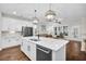 Stylish kitchen with island, pendant lighting, and stainless steel appliances at 182 Callibluff Dr, Summerville, SC 29486