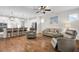 Open living space shows kitchen, living room and dining area with hardwood floors at 182 Callibluff Dr, Summerville, SC 29486