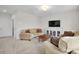 Inviting living room featuring comfortable seating, neutral decor, and a media center for relaxation and entertainment at 182 Callibluff Dr, Summerville, SC 29486