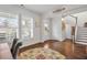 Inviting living room with hardwood floors, bright windows, and elegant decor at 182 Callibluff Dr, Summerville, SC 29486