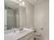 Clean bathroom featuring a bright mirror, white vanity, toilet, and shower creating a fresh and well-maintained space at 202 Crestwood Dr, Summerville, SC 29483