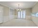 Bright and airy dining room featuring French doors and built-in cabinets at 202 Crestwood Dr, Summerville, SC 29483