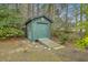 Backyard view showing the shed with a ramp in the yard at 202 Crestwood Dr, Summerville, SC 29483
