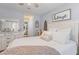 Comfortable bedroom with bright white accents, stylish decor, and a serene ambiance at 205 Yellow Hawthorn Cir, Summerville, SC 29483