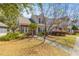 Charming exterior elevation showcasing landscaped front yard, sidewalk, and welcoming curb appeal at 205 Yellow Hawthorn Cir, Summerville, SC 29483