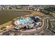 Community pool and recreational area viewed from above, with houses and parking nearby at 207 Billinger St, Summerville, SC 29486