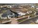 Aerial view of community farmland and barn with neighborhood in the background at 207 Billinger St, Summerville, SC 29486