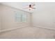Bedroom featuring neutral walls, carpet flooring, and a window for natural light at 207 Billinger St, Summerville, SC 29486