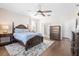 Spacious main bedroom featuring hardwood floors, a ceiling fan, and two windows at 207 Billinger St, Summerville, SC 29486