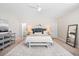 A main bedroom with a neutral color scheme, fan, and plenty of natural light at 207 Billinger St, Summerville, SC 29486
