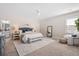 Spacious main bedroom with a ceiling fan, neutral decor, and an en suite bathroom at 207 Billinger St, Summerville, SC 29486