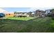Large backyard with pool, wooden deck, and shed with DirectTV satellite at 2150 Pimlico Dr, Ridgeville, SC 29472