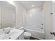 Bright bathroom with a large mirror, white vanity, and shower-tub combination at 2150 Pimlico Dr, Ridgeville, SC 29472
