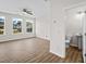 Bright living room with backyard views and an adjacent half bathroom at 2150 Pimlico Dr, Ridgeville, SC 29472