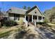 Charming home with a welcoming front porch and nicely landscaped yard at 2164 Highway 78, Dorchester, SC 29437