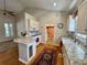 Bright kitchen with white cabinetry, granite countertops, and modern appliances at 2164 Highway 78, Dorchester, SC 29437
